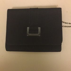 Trifold wallet with zippered change pocket